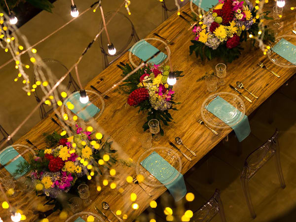 Grand Cliff Front Residence - Dinner table set by night